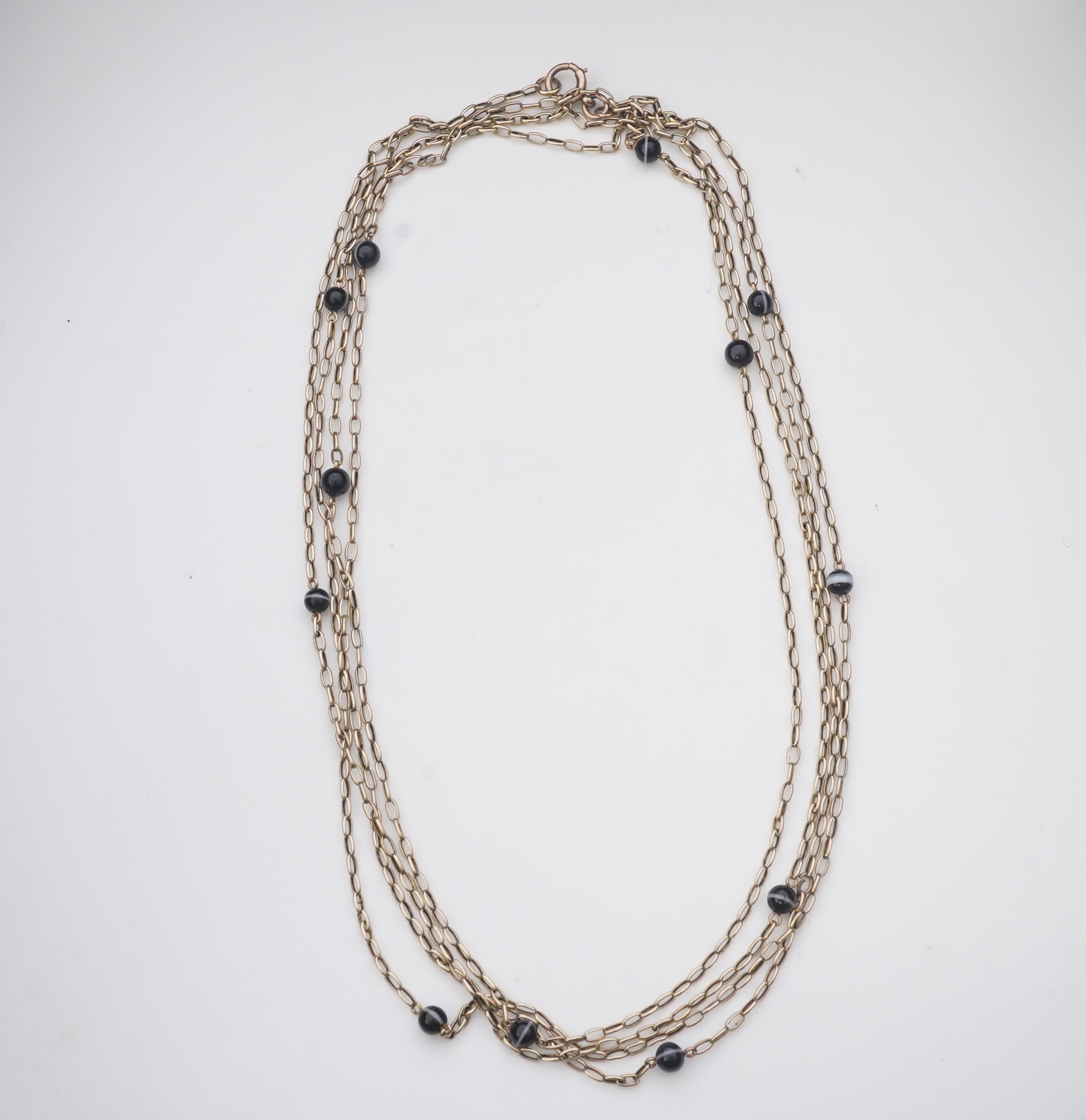 An elegant onyx longchain necklace, early 20th century